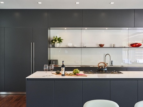 modern kitchen with dark grey cabinets 
