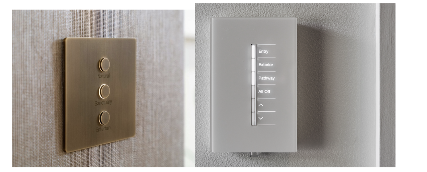 Two examples of smart home control switches are mounted on the wall, one in bronze and the other in sleek white.