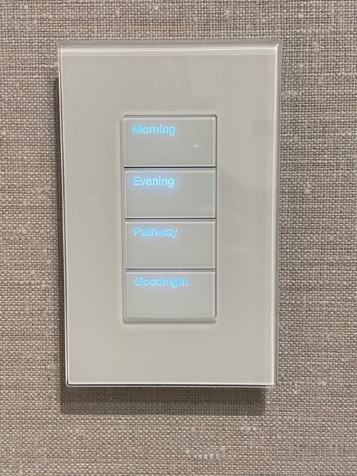 Modern Smart Home Control Switch With 4 Different Settings Mounted on Wall