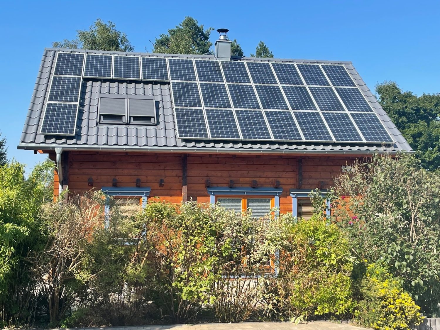 home in germany with solar panels on the roof
